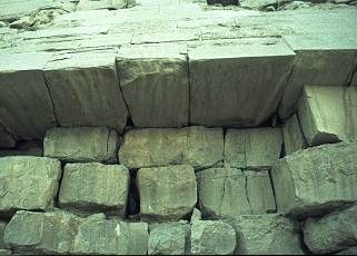 uneven blocks behind casing, bent pyramid